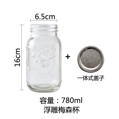 Clear glass mason jar with lid