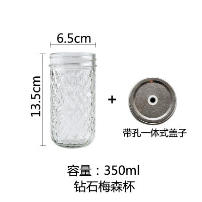 Clear glass mason jar with lid